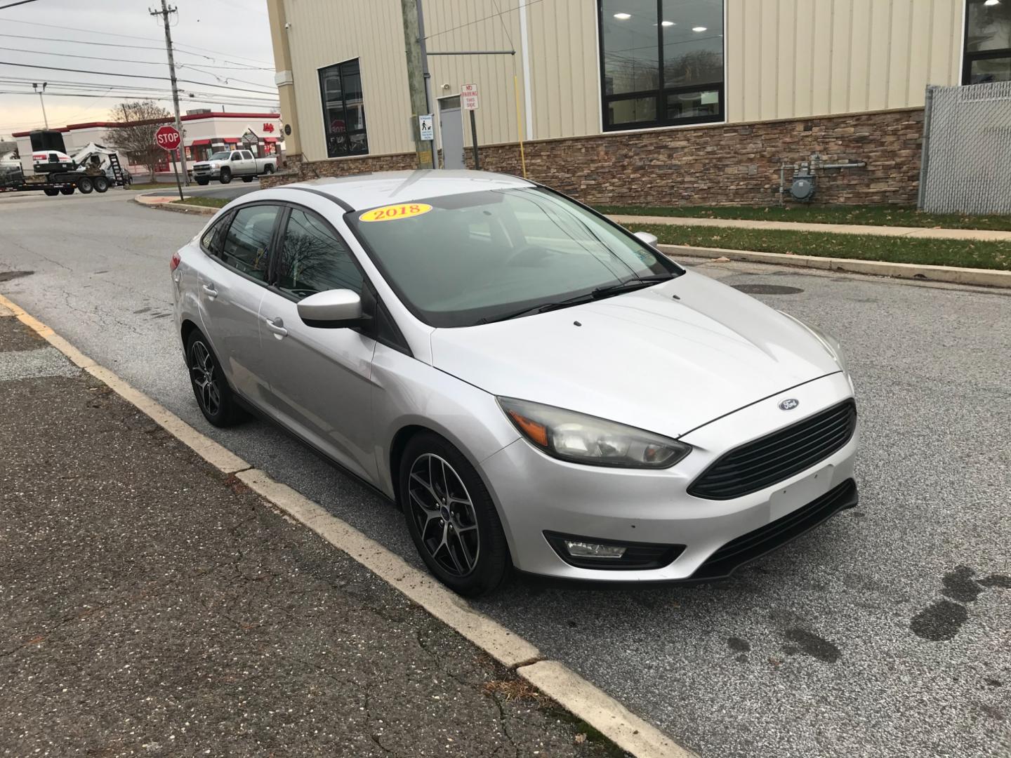 2018 Silver /Gray Ford Focus SE (1FADP3F24JL) with an 2.0 V4 engine, Automatic transmission, located at 577 Chester Pike, Prospect Park, PA, 19076, (610) 237-1015, 39.886154, -75.302338 - Photo#3